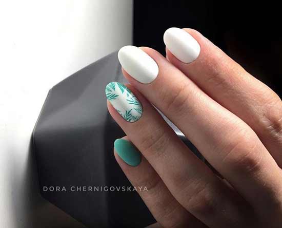 Light green accent on one nail