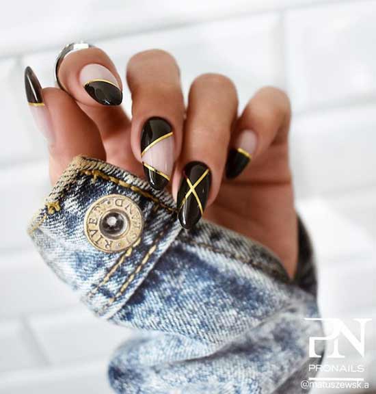 Black manicure with gold photo