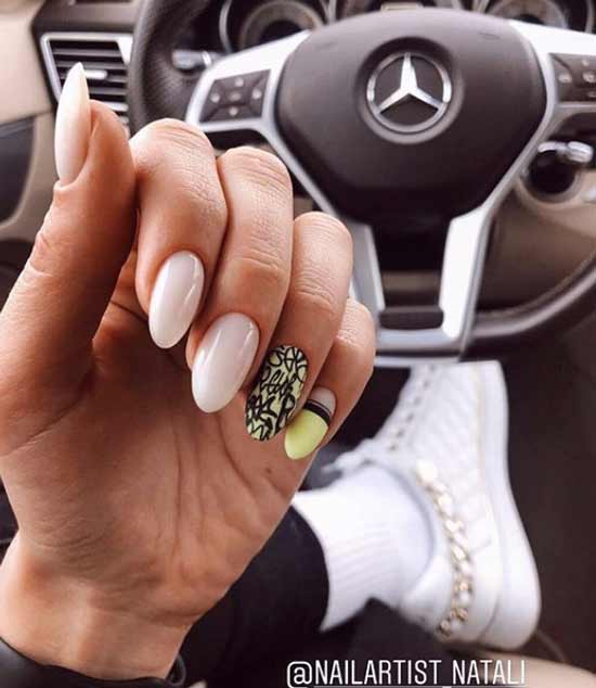 Nude manicure with a bright pattern