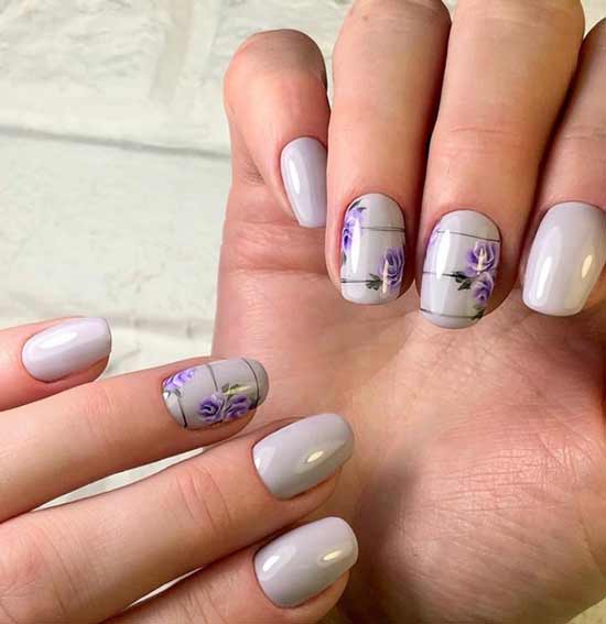 Flowers on a gray background of nails