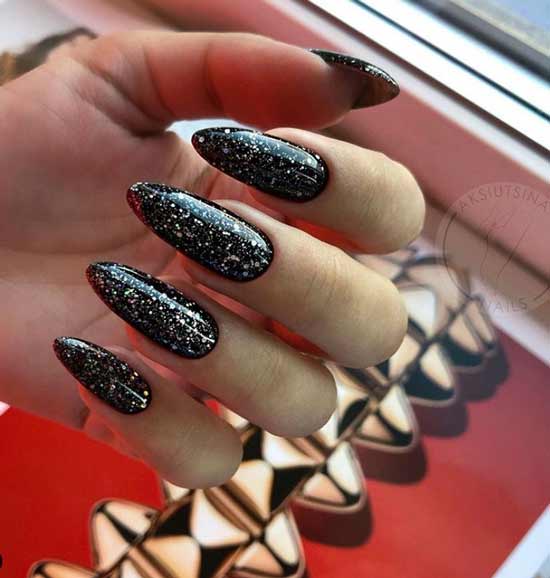 Black manicure with large sequins