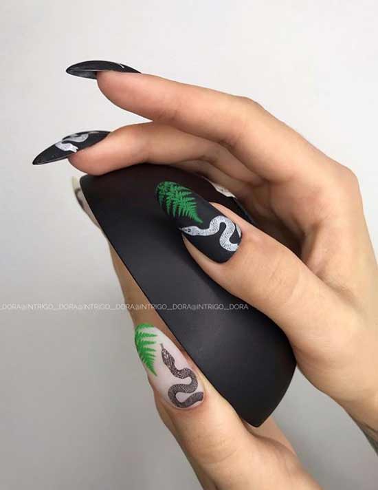 Matte black manicure with a snake