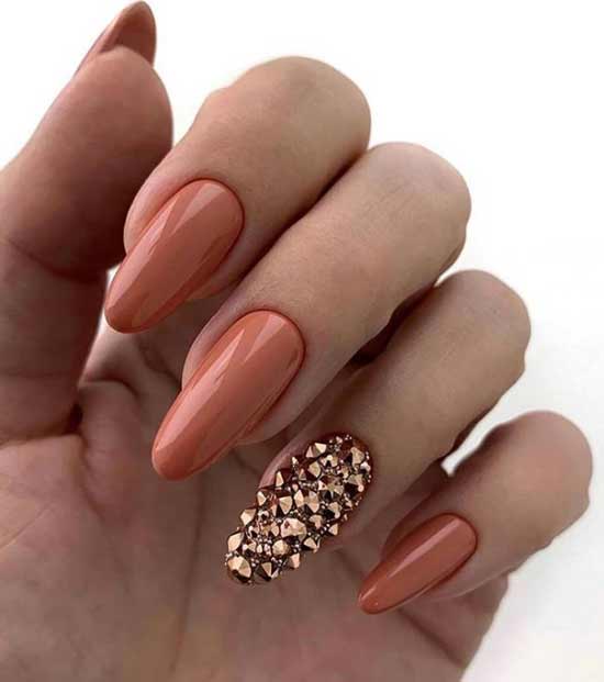 Brown manicure with rhinestones