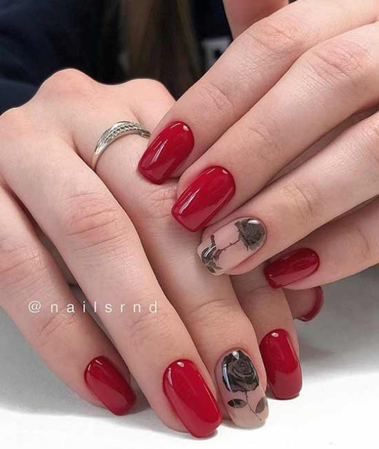 Manucure rouge avec rose noire