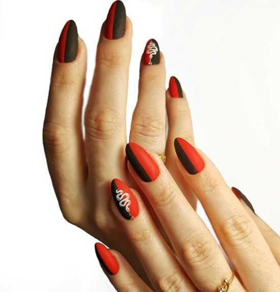 Nail art sur fond rouge et noir