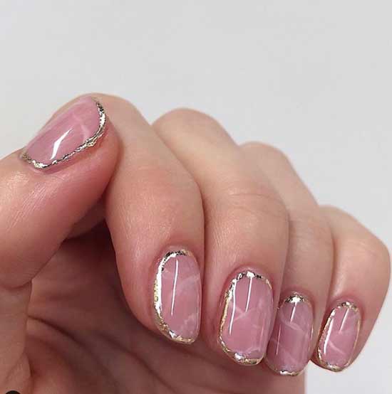 Wedding manicure with gold frame