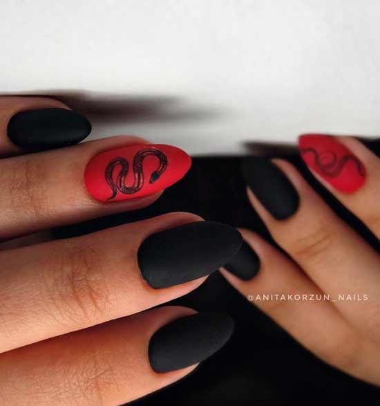 Black and red manicure with a snake