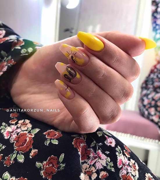 Black snake on yellow nails photo