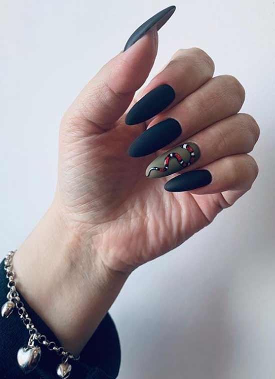 Dark manicure and snake drawing