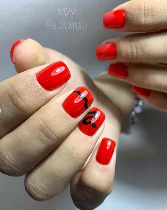 Red manicure black animal print