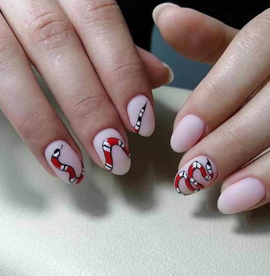 Red snake on nails