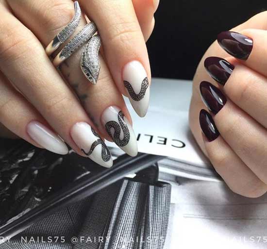 Two-tone manicure with a snake