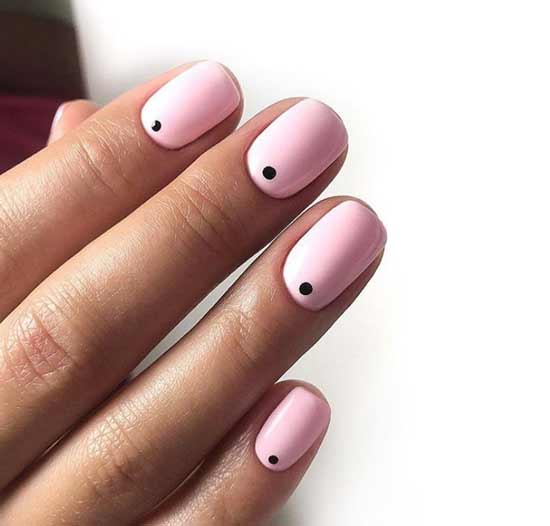 Pink manicure with dots