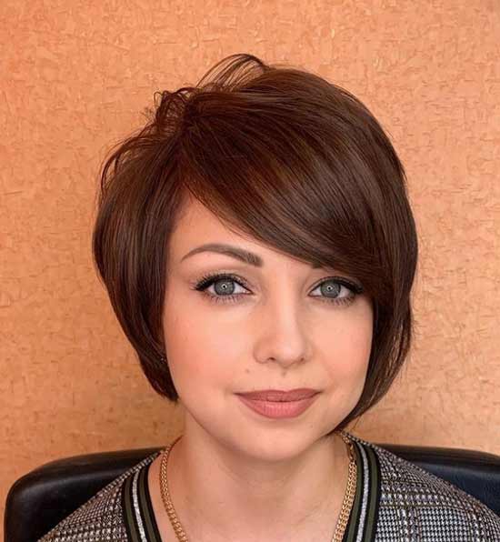 Asymmetrical short haircut with bangs