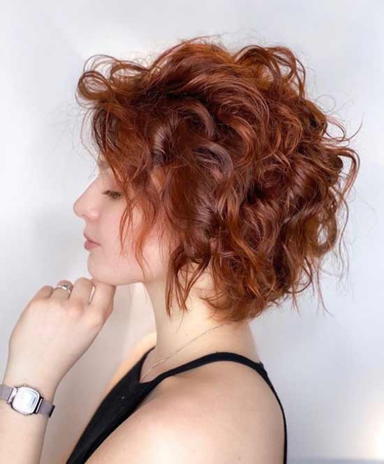 Short curly haircut with bangs