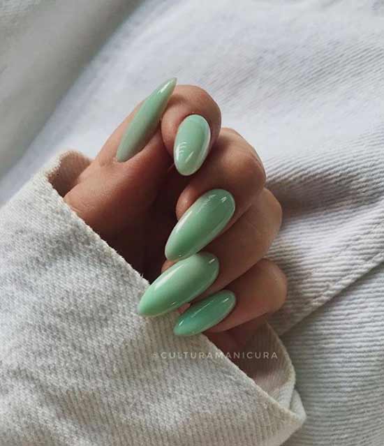 Mint manicure long nails tanned hands