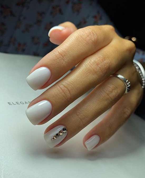 Milk manicure with rhinestones