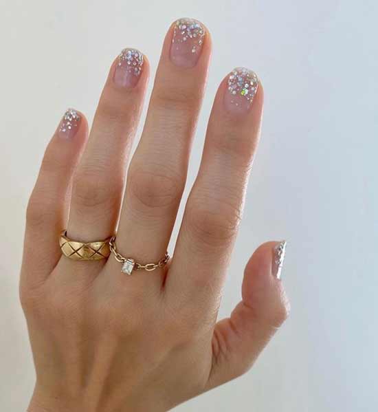 Rhinestones on a transparent background of nails