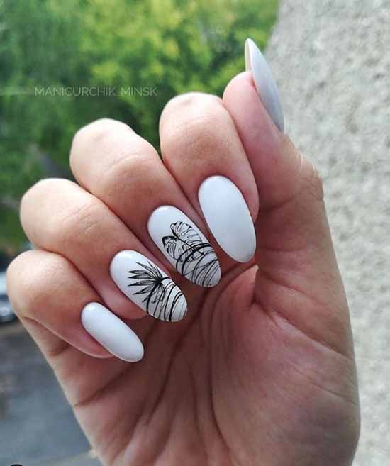 White manicure with spiderweb