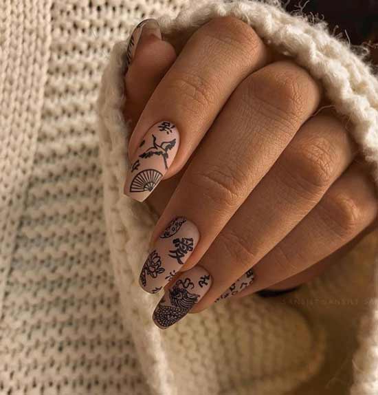 Beige matte nails with designs