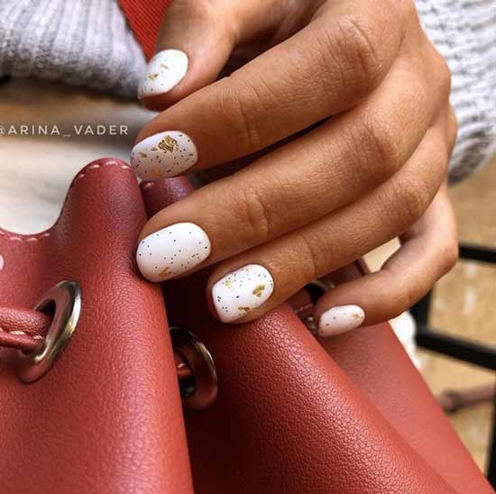 White with gold manicure