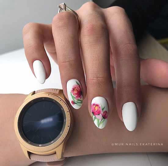 White manicure with a bright pattern