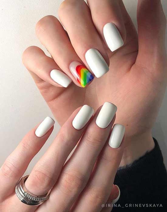 White manicure with neon rainbow