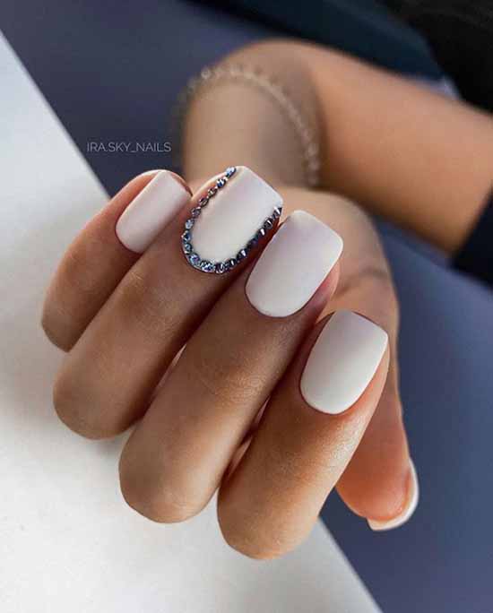 White manicure design rhinestones