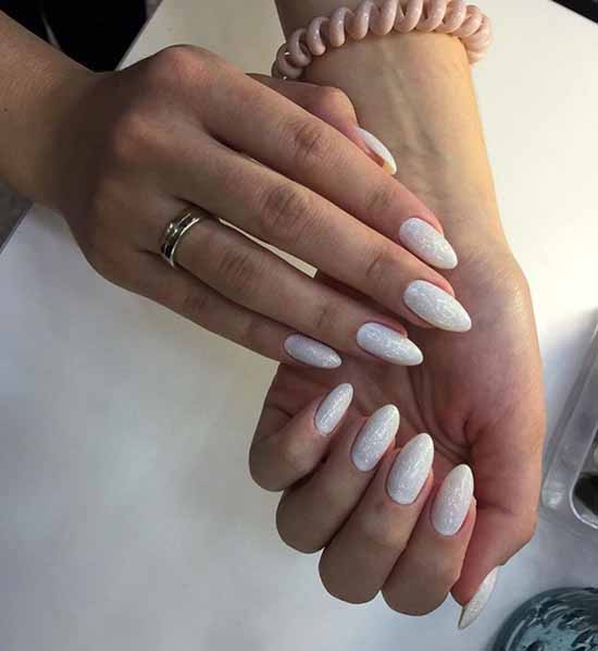 White nails with designs: new items, manicure ideas in the photo