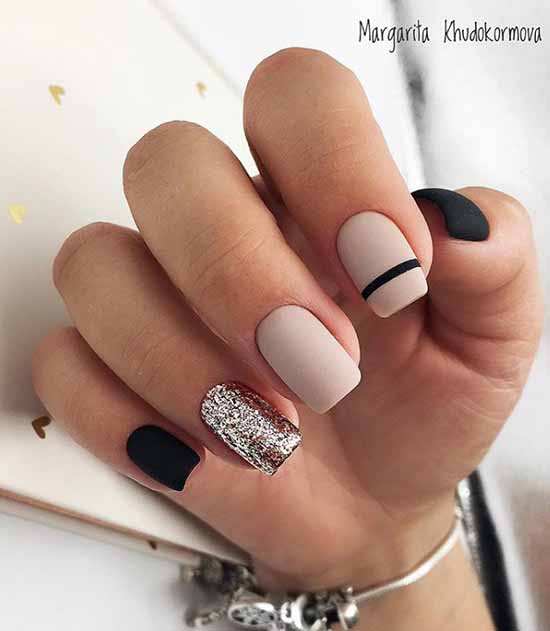 Black and beige manicure and glitter decor