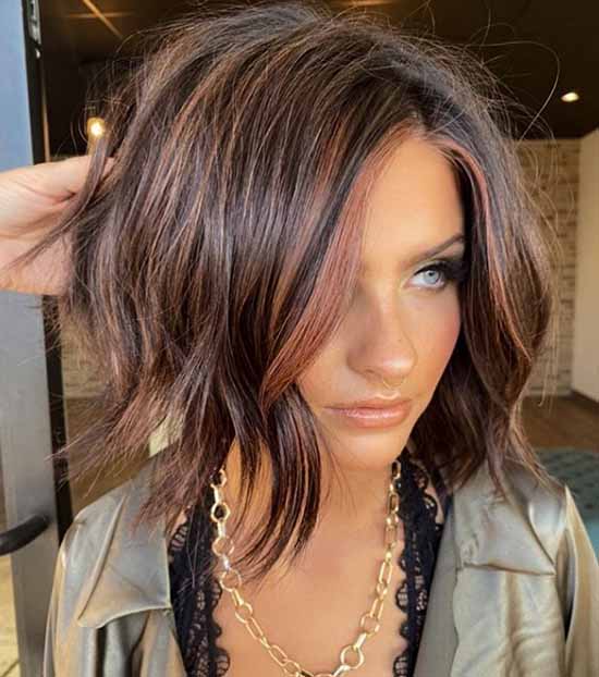 Fashionable short haircut with long bangs