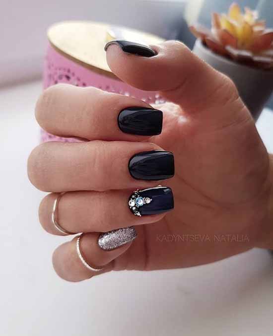 Rhinestones and sequins on black nail cover