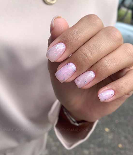 Beautiful manicure short nails and silver