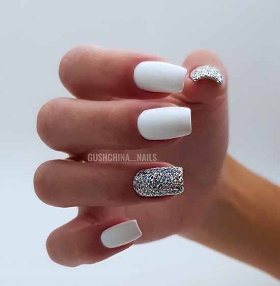 White manicure with silver decor