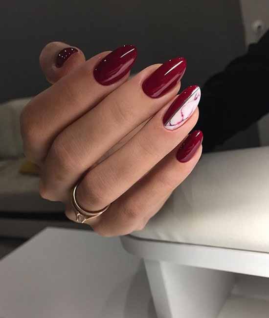 Dark red glitter manicure