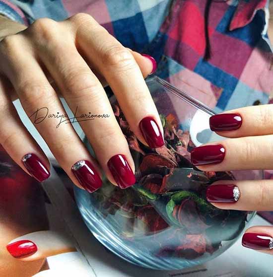 Dark red glitter silver manicure