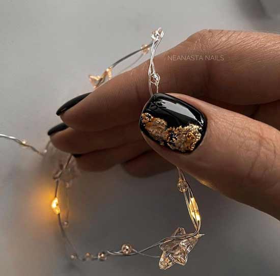 Black nails with gold leaf