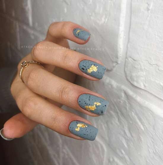 Gray matte manicure with gold leaf