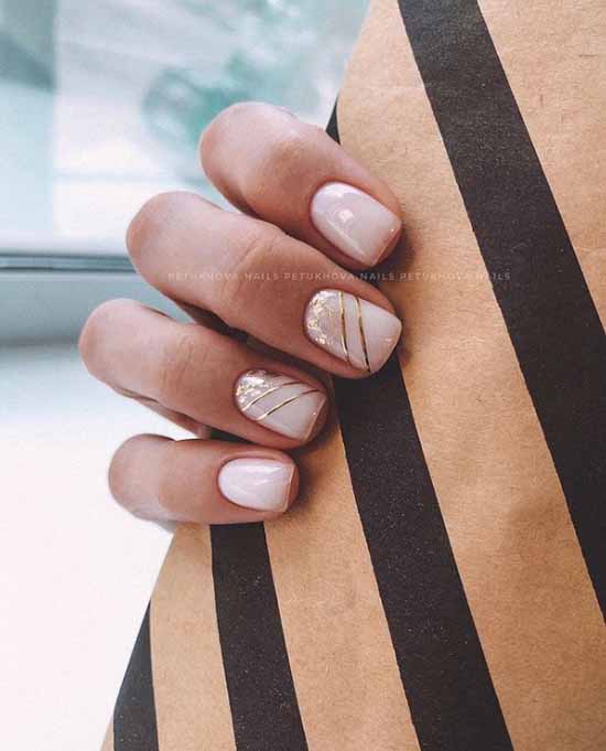 Beige nails with gold leaf