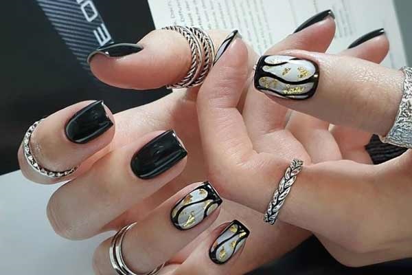 Design ideas black manicure with foil decor