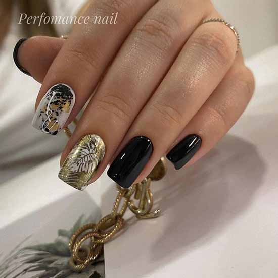 Black manicure with gold foil