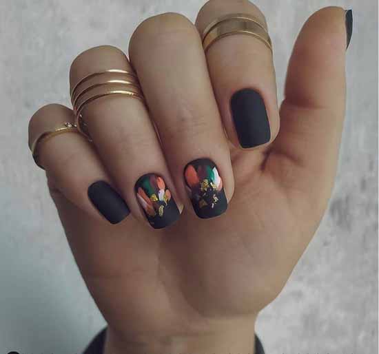 Matte black manicure with foil