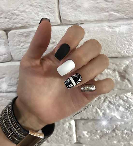 Black and white manicure with gold leaf