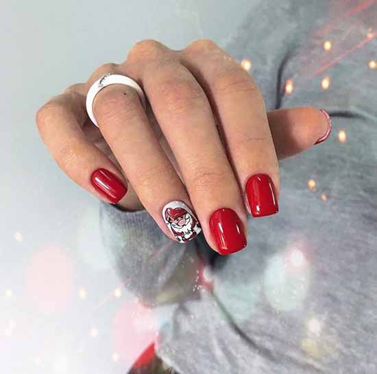 Red manicure and drawing on one nail