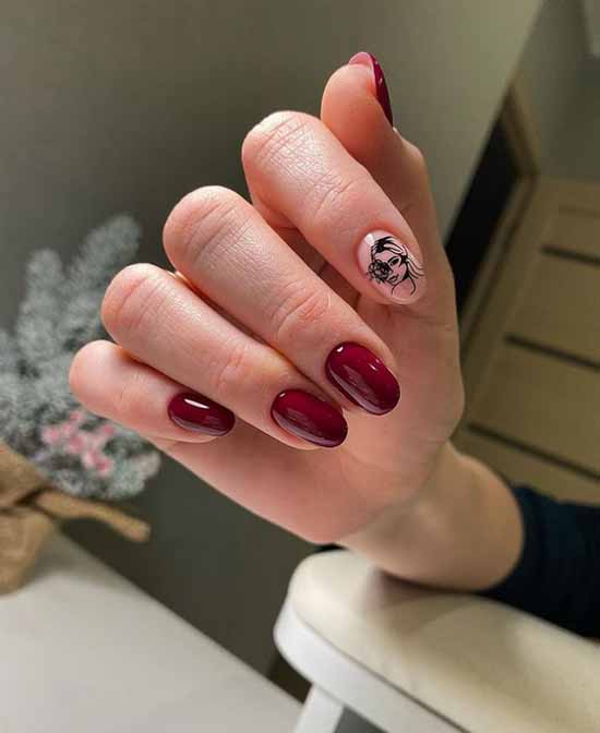 Burgundy manicure index finger design