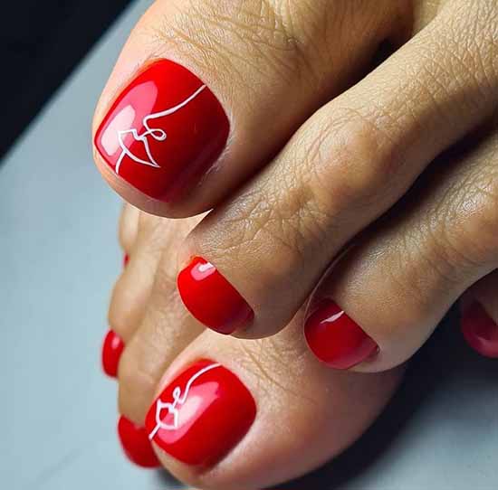 Red pedicure with white pattern