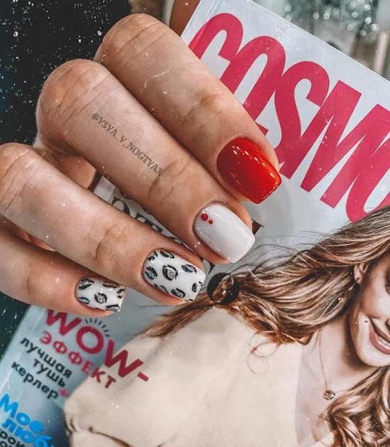 White nails with glitter and predatory print