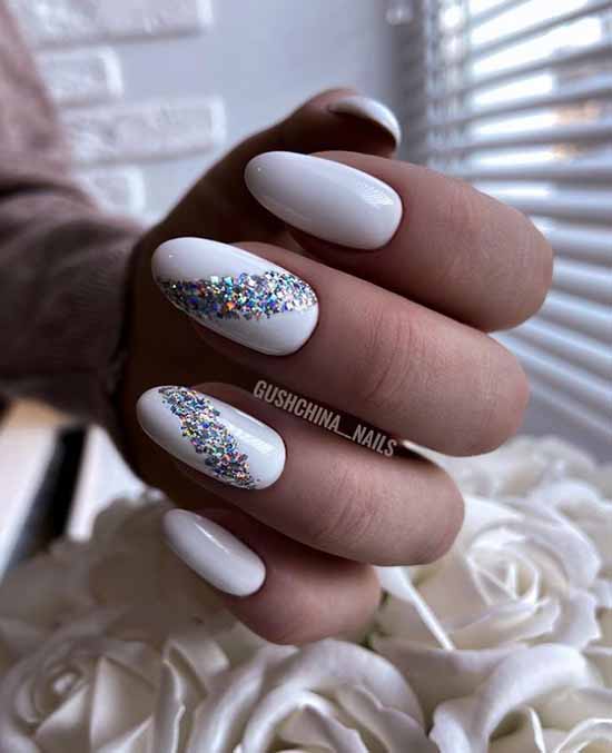 White nails with multi-colored glitters