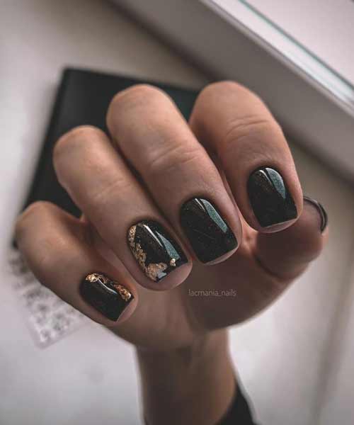 Black manicure with foil