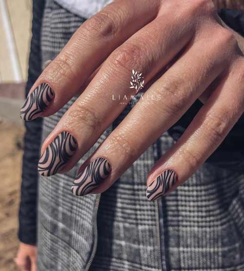 Black animal print on nails